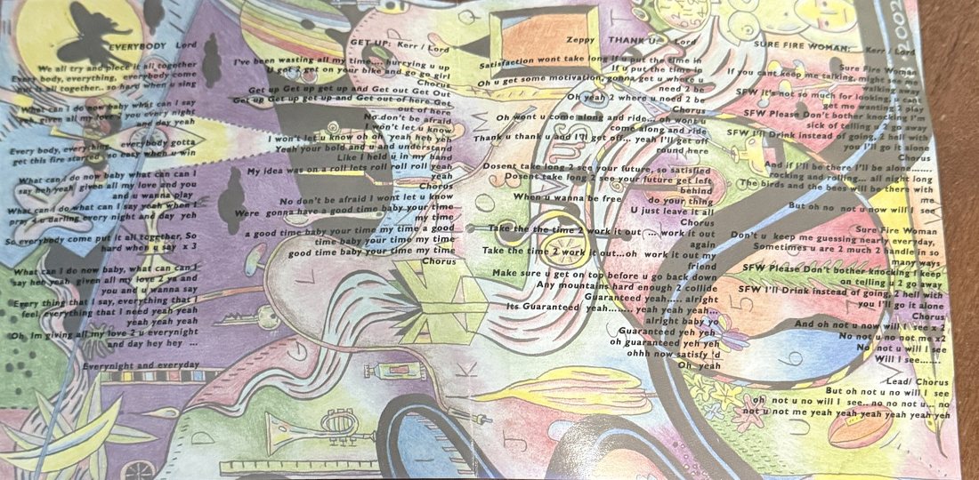 Moonjuice Sero Sed Serio lyric booklet spread, 2002